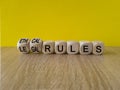 Ethical or legal rules symbol. Turned wooden cubes and changes words \'ethical rules\' to \'legal rules\' Royalty Free Stock Photo