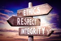 Ethics, respect, integrity - wooden signpost, roadsign with three arrows