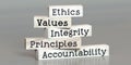 Ethics, values, integrity, principles, accountability - words on wooden blocks