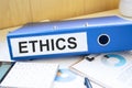 ethics words on labels with document binders