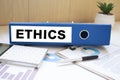 ethics words on labels with document binders