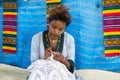 Ethiopia, Bahir Dar, January 2015 : A woman knit a dress, EDITOR