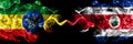 Ethiopia, Ethiopian vs Costa Rica, coat smoky mystic flags placed side by side. Thick colored silky abstract smoke flags