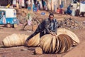 Ethiopian man sells wicker baskets on the street Royalty Free Stock Photo