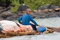 Ethiopian native transports goods on Lake Tana. Royalty Free Stock Photo