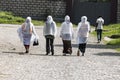 Ethiopian Orthodox women wearing white capes heading towards church in Addis Ababa Ethiopia