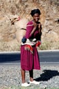 Ethiopian woman carrying load Royalty Free Stock Photo