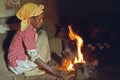 Ethiopian woman is cooking on a wood fire