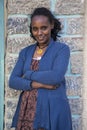 Ethiopian woman in front of her house.