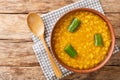 Ethiopian Yellow Split Peas Curry Kik Alicha closeup in the bowl. Horizontal top view