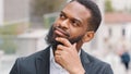 Ethnic bearded African American man entrepreneur pensive manager executive thoughtful worker employer ponder think about