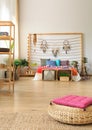 Bedroom with shelves and ottoman