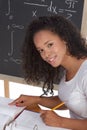 Ethnic black college student studying math exam Royalty Free Stock Photo