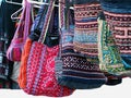 Brightly Colored Boho Bags or Purses in a Market Stall