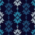 Ethnic boho blue seamless pattern. Embroidery on fabric. Retro motif.