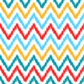 Ethnic colorful ikat abstract geometric chevron pattern in white, blue, red and yellow,