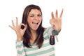 Ethnic Female with Car Keys and Okay Hand Sign