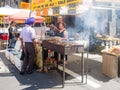 Ethnic food for sale at a street stand in downtown New York