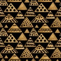 Ethnic gold hand painted seamless pattern. Abstract pyramids golden background. Tribal aztec texture.