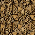 Ethnic gold hand painted seamless pattern. Abstract triangles golden background. Tribal aztec texture.