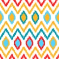 Ethnic ikat abstract colorful geometric pattern in white, yellow, red and blue, vector