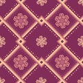 Ethnic pattern with geometric seamless flower in purple background for fabric with autumn color Royalty Free Stock Photo