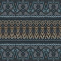 Ethnic seamless pattern with american indian traditional ornament in blue and gold colors. Royalty Free Stock Photo