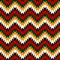 Ethnic seamless pattern with chevron lines. Native americans ornament. Tribal motif. Christmas colors mosaic wallpaper