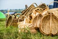 Ethnic souvenirs on the market counter. baskets for mushrooms and berries from wooden rods