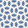 Ethnic, tribal wallpaper. Repeated segmented circles seamless pattern. Openwork ornament. Delicate ornamental background