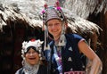 Ethnic woman and Caucasian girl dressed alike