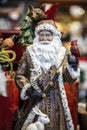 Ethnic Woodland Santa Christmas decoration  with owl and rabbit and fox and cardinal with bokeh background Royalty Free Stock Photo