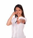 Ethnic young woman looking at you saying call me Royalty Free Stock Photo
