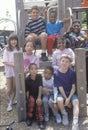 Ethnically diverse group of children in a city park, Chicago, IL