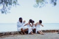 Ethnicity Happy Family Africans Enjoy relaxation resting on the beach summer vacation time