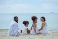 Ethnicity Happy Family Africans Enjoy relaxation resting on the beach summer vacation time Royalty Free Stock Photo