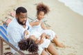 Ethnicity Happy Family Africans Enjoy relaxation resting on the beach summer Royalty Free Stock Photo