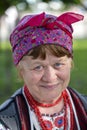 Ethno-fest : traditions - emotions - life. Portrait of an elderly woman in Ukrainian national clothes, historical reconstruction o