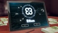 Ethos cryptocurrency logo on the pc tablet, 3D illustration