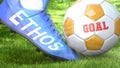 Ethos and a life goal - pictured as word Ethos on a football shoe to symbolize that Ethos can impact a goal and is a factor in