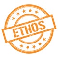 ETHOS text written on orange vintage stamp