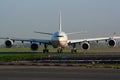 Etihad Airways Airbus A340-600 A6-EHK passenger plane arrival and landing at Paris Charles de Gaulle Airport Royalty Free Stock Photo