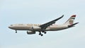 Etihad Airways Airbus A330 with F1 2014 livery landing at Changi Airport Royalty Free Stock Photo