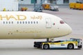 Etihad Airways airplane being towed