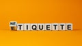 Etiquette or netiquette. Turned cube and changed the word `etiquette` to `netiquette`. Beautiful orange background. Business