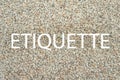 Etiquette - word on stone background as blank for design