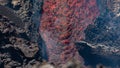 Etna - lava fall detail on volcano  in Sicily with smoke and acid vapor Royalty Free Stock Photo