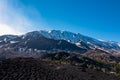 Etna - Sartorio crater In front of snow capped volcano mount Etna in Catania, Sicily, Italy, Europe Royalty Free Stock Photo