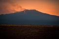 Etna volcano erupting at sunset Royalty Free Stock Photo