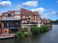 Restaurant and apartment buildings on the banks of the Thames River